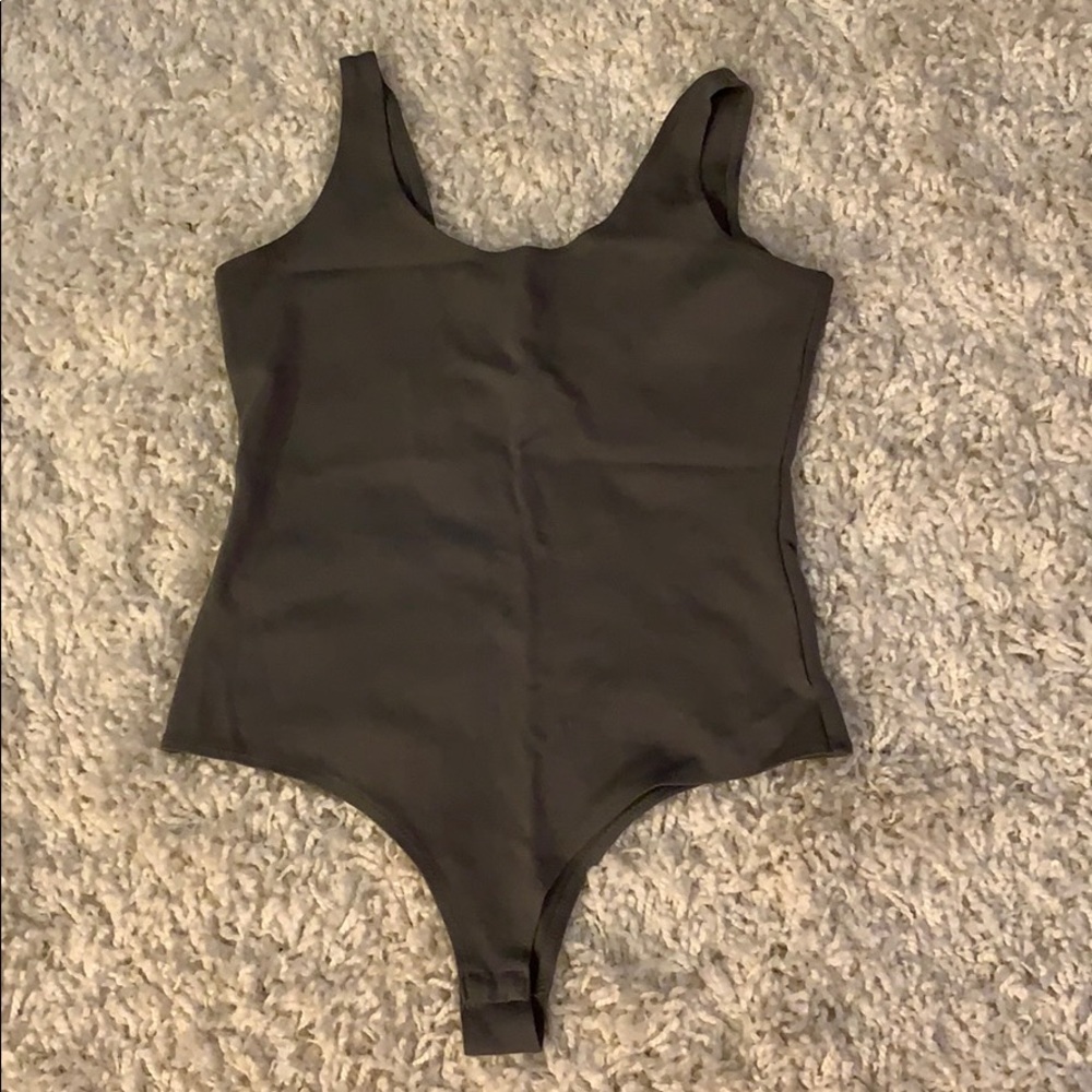 Green body suit